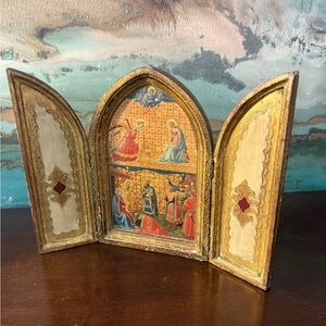 Vintage wooden ornate depicting the Annunciation and Adoration of the Magi.